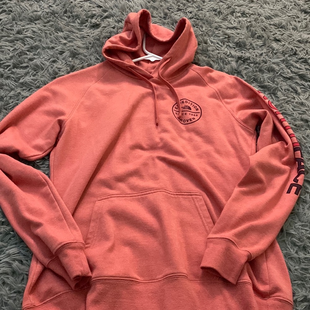 Really cute reddish orange north face hoodie
